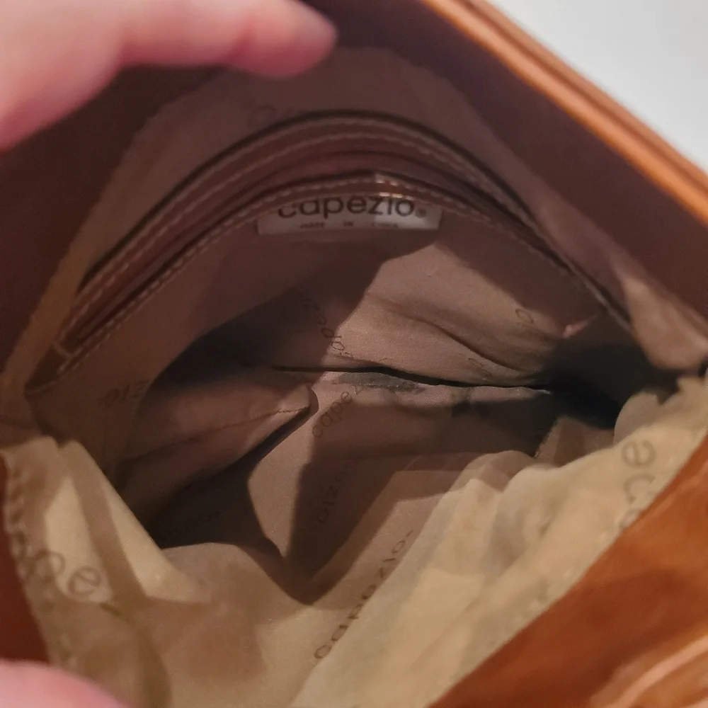 Vintage Capezio Cognac Bucket Crossbody Bag – Classic Gold Medallion